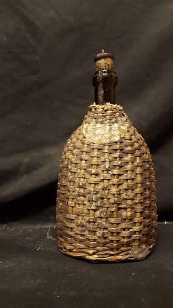 Wicker Covered Glass Bottle
