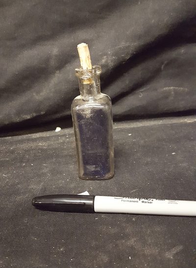 Glass Vial with Gel inside and wooden cork