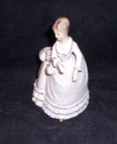 Candle holder woman in a dress