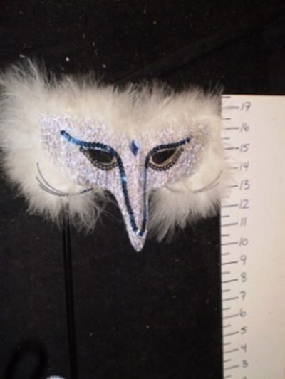 Silver masquerade mask on a stick