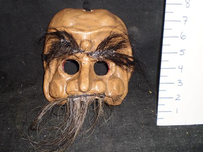 Brown mask with black, hairy mustache and eyebrows
