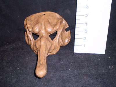 Brown mean-eyed mask with long nose