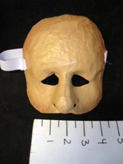 Small faced sad half mask,