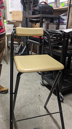 wooden chair with metal legs