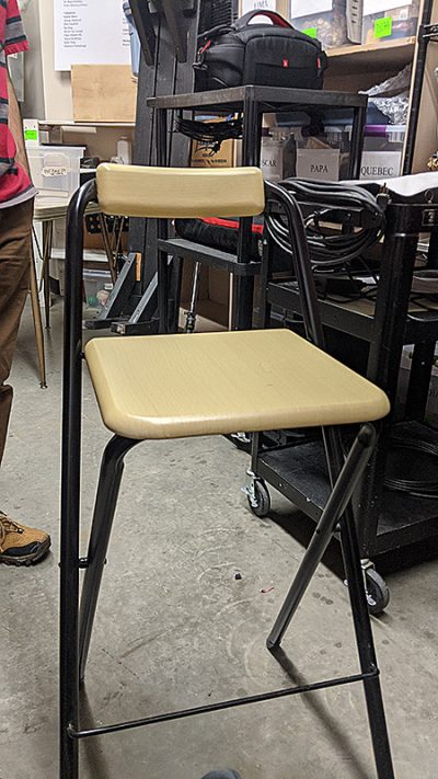 wooden chair with metal legs