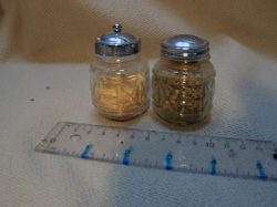 Salt & pepper shakers, small, glass, silver top
