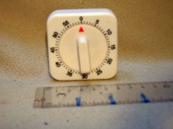 White plastic egg timer