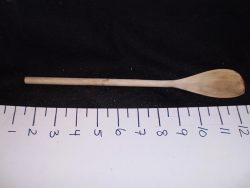 Wooden spoon with an off-centre point