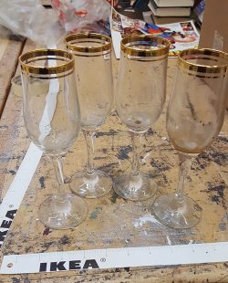 Set of gold rimmed Champagne flutes