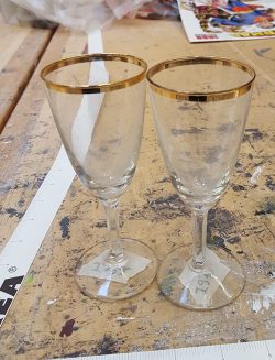 Set of gold rimmer glasses