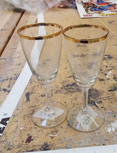 Set of gold rimmer glasses