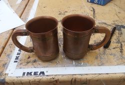 Tarnished copper steins