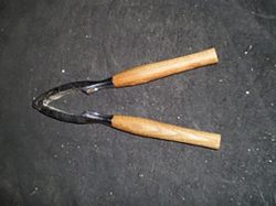 Wooden handled nut cracker