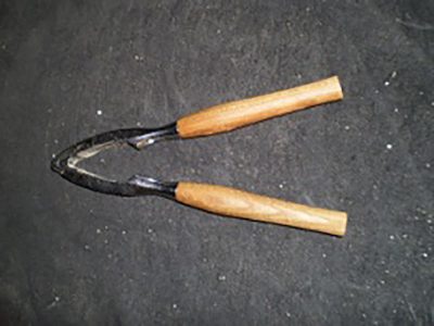 Wooden handled nut cracker
