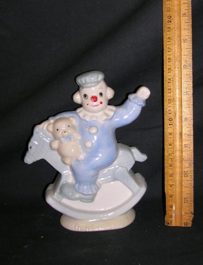 Clown on rocking horse