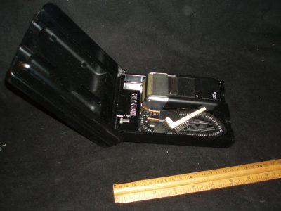 Electric razor in black case