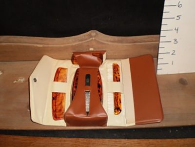 Vanity kit in brown case