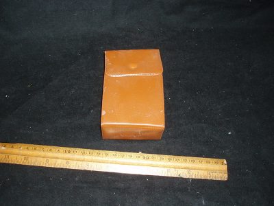 Brush in Brown container