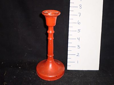 Red glass candlestick holder