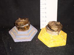 Incense burners on layered pedestals