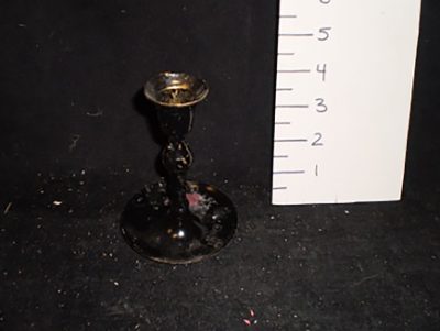 Black brass candlestick with circular bottom/base