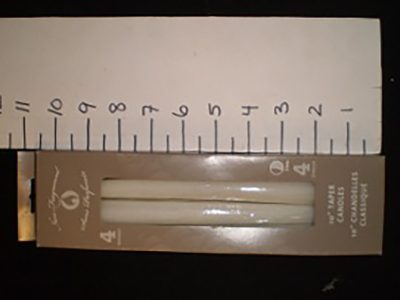 Box of unused white tapers - unscented