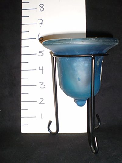 Blue glass candle holder with black base