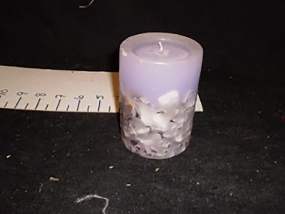 Purple Candle with Rocks