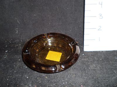 Ashtray, dark amber glass round