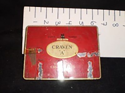 Red Craven “A” cigarette tin