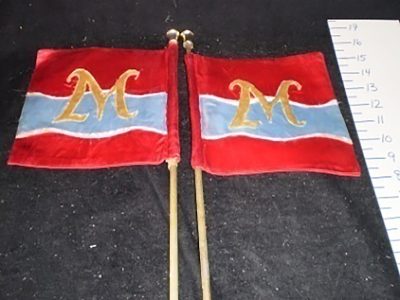 Flags, small, “M”, royal-esque, on poles