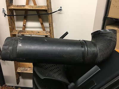 Black metal ventilation pipe