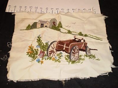 Cloth, embroidered, cart design