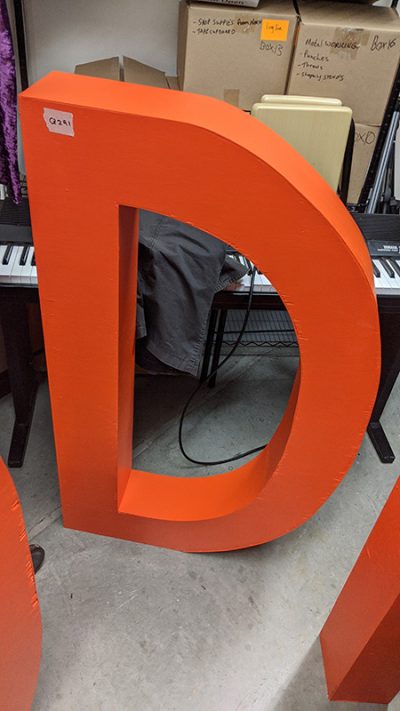 Orange big wooden letter D