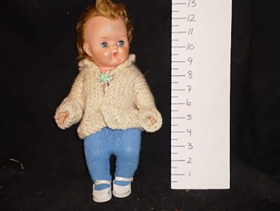 Doll plastic with moving eyes and sucks thumb