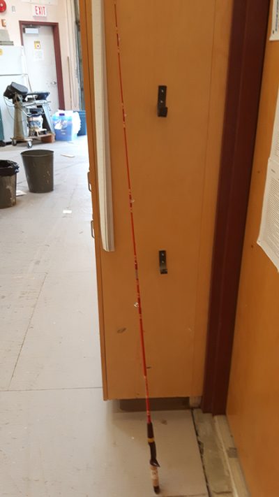 Old red fishing pole