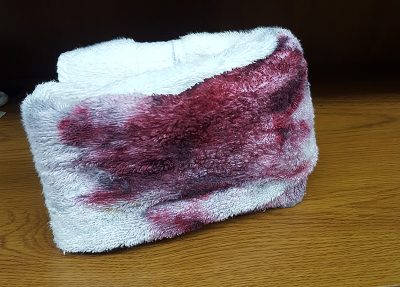 White bloodied hand towel