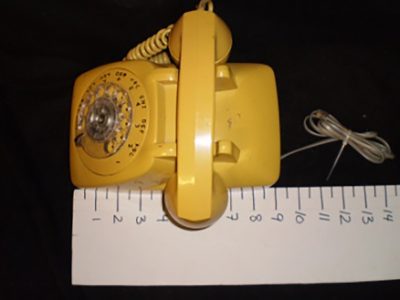 Canary yellow rotary phone