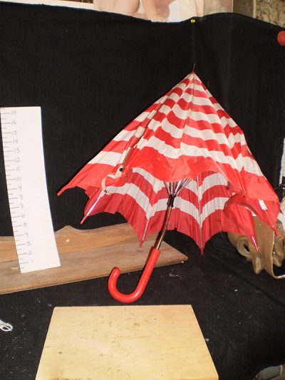 Red and white horizontal striped umbrella